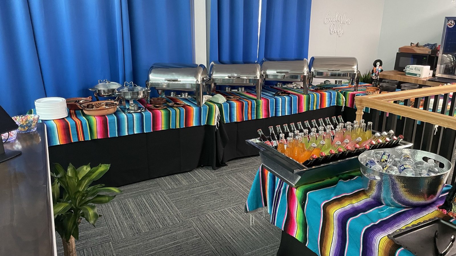 Buffet tables set up with Mexican-themed catering