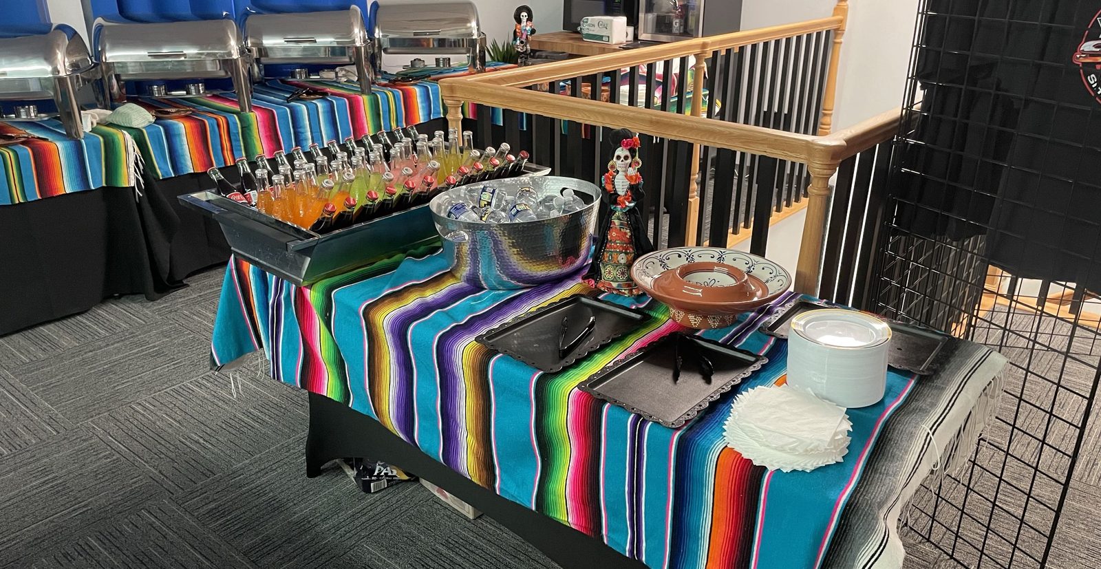 Refreshments table with imported sodas and decoration