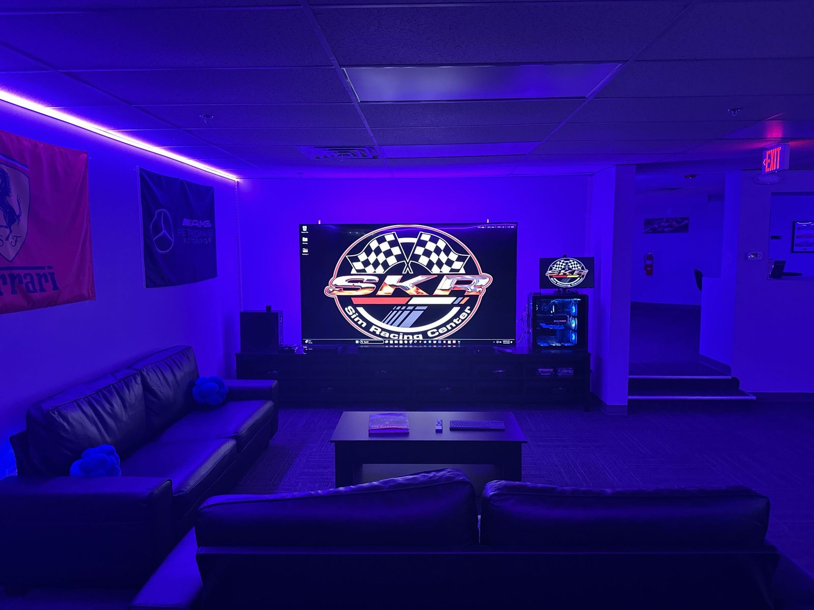 Member lounge with mood lighting and big-screen display